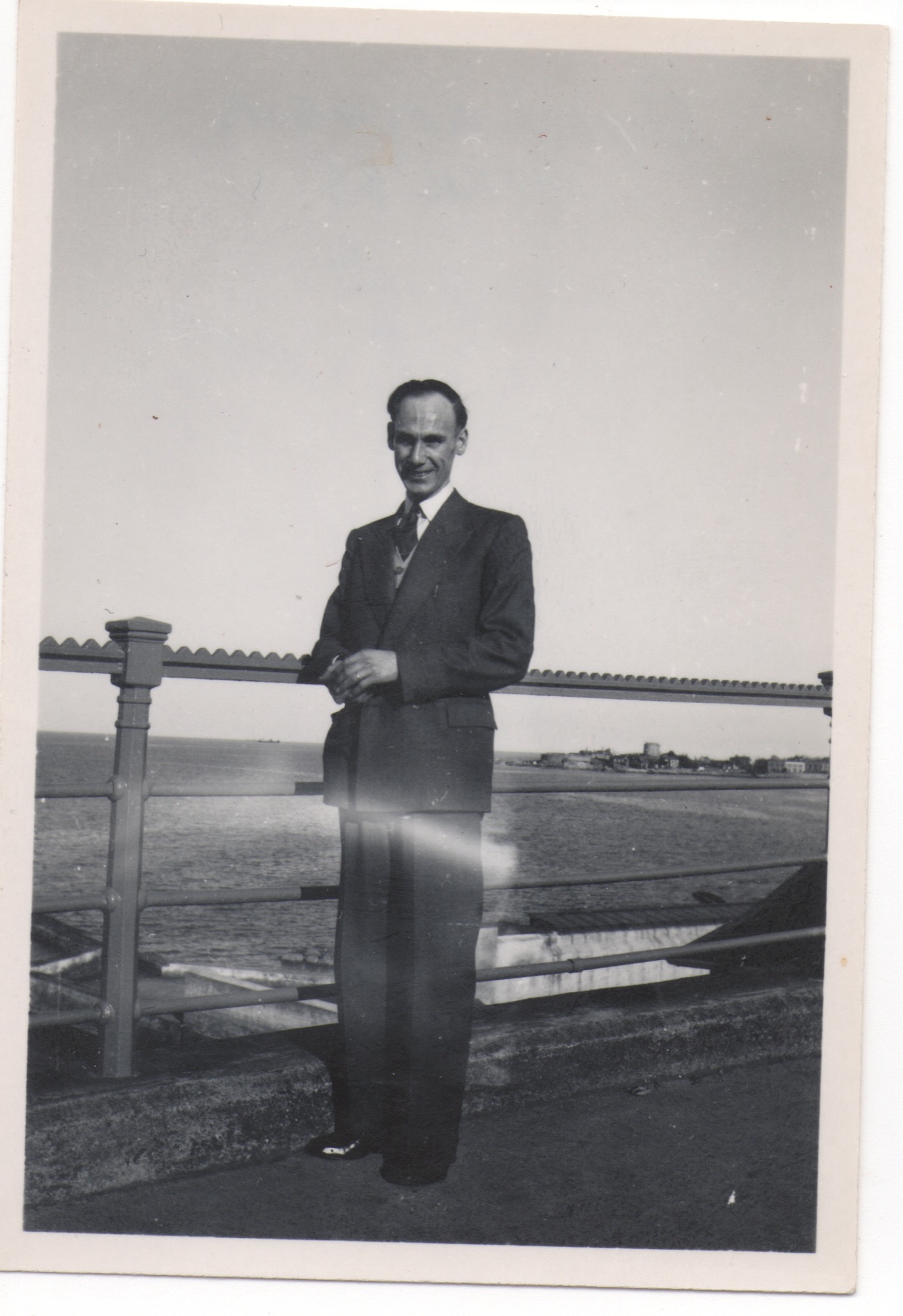 A young Charles Cable Savage, post-demob, on a seaside promenade in the late 1940s