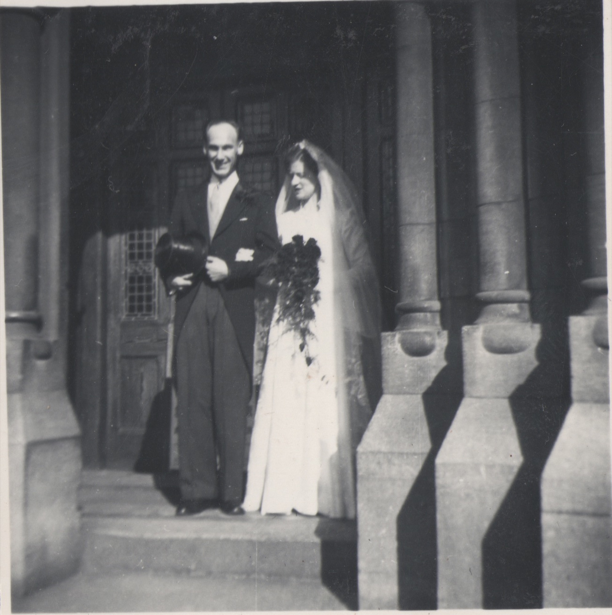 Charles and Maureen in the church porch after the wedding