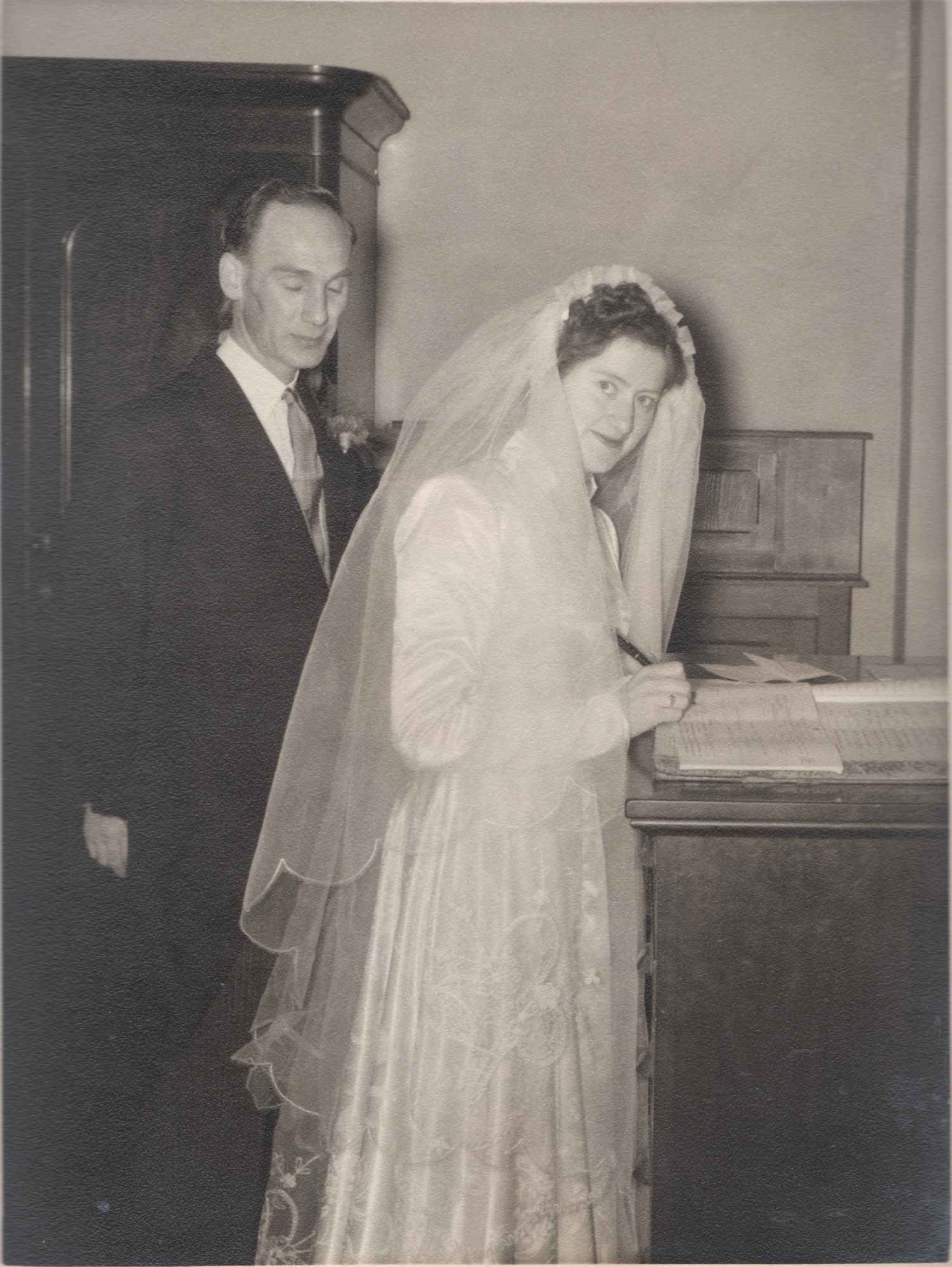 Signing the marriage register at St Columba's